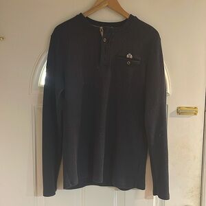 Long sleeved blue Henley